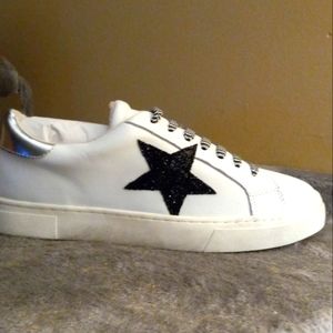 Steve Madden sneakers.  Fashioned after Golden Goose Converse